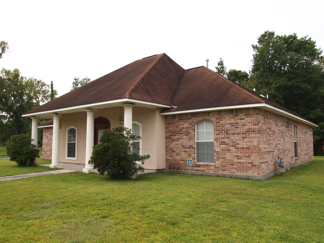 Cajun Soft Wash house Washing exterior soft power wash dirt stain roof